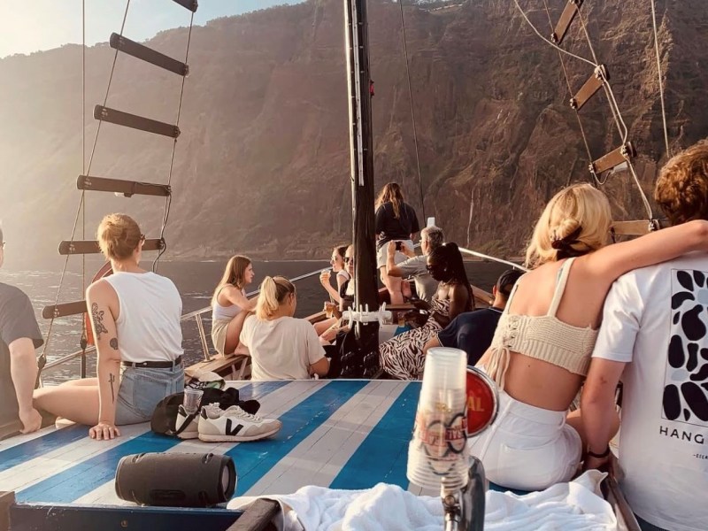 a group of people sitting at a table