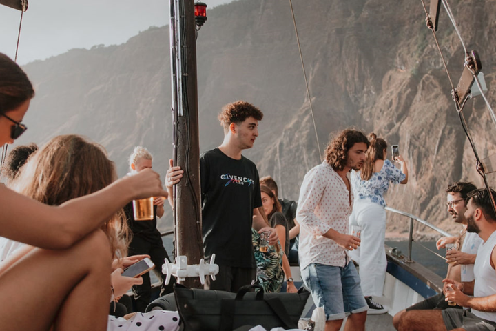 a group of people standing next to a person